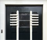 Detail deur van de dienstingang.
<br/>
Jan van Galen RCE, 2016-06-18